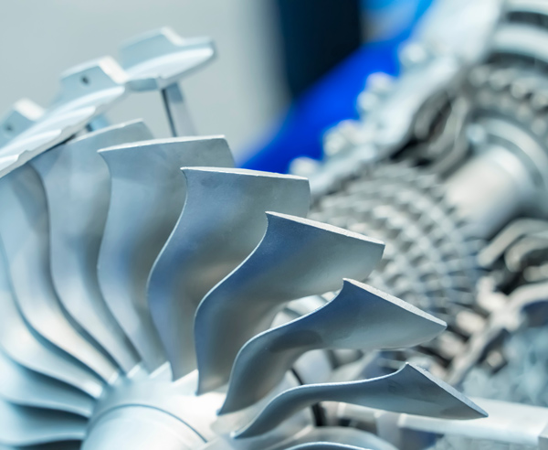 close-up of aircraft engine turbine blades showcasing intricate design for optimal performance and efficiency in aviation technology with five turbine components clearly visible